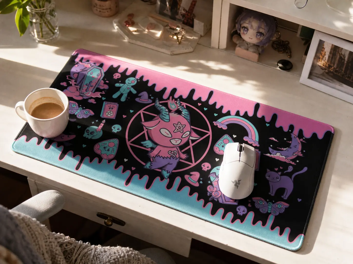 Large pastel pink and blue kawaii anime desk mat on a white wooden desk with a gaming mouse