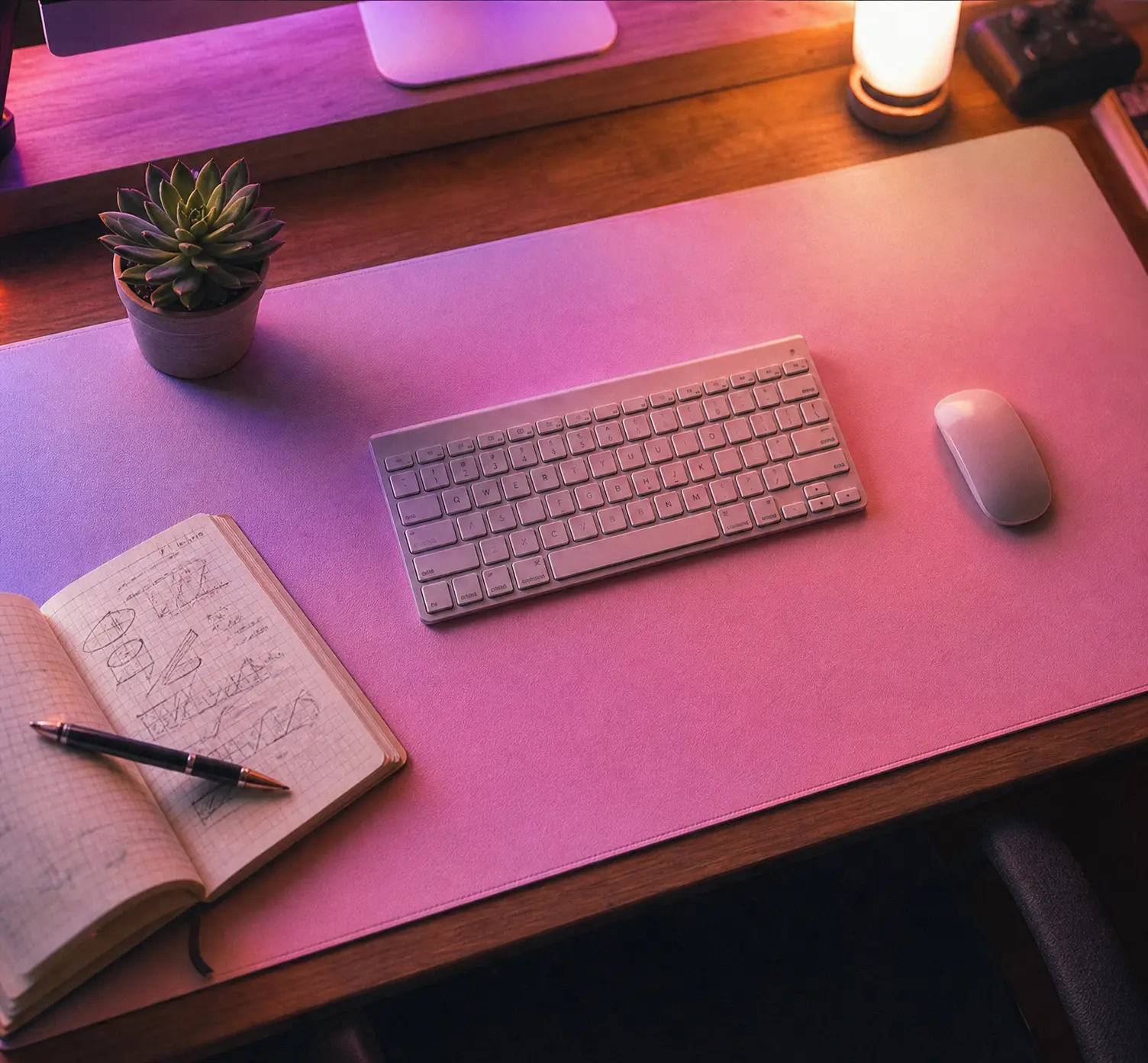 Large pastel gradient desk mat on a cozy gaming setup