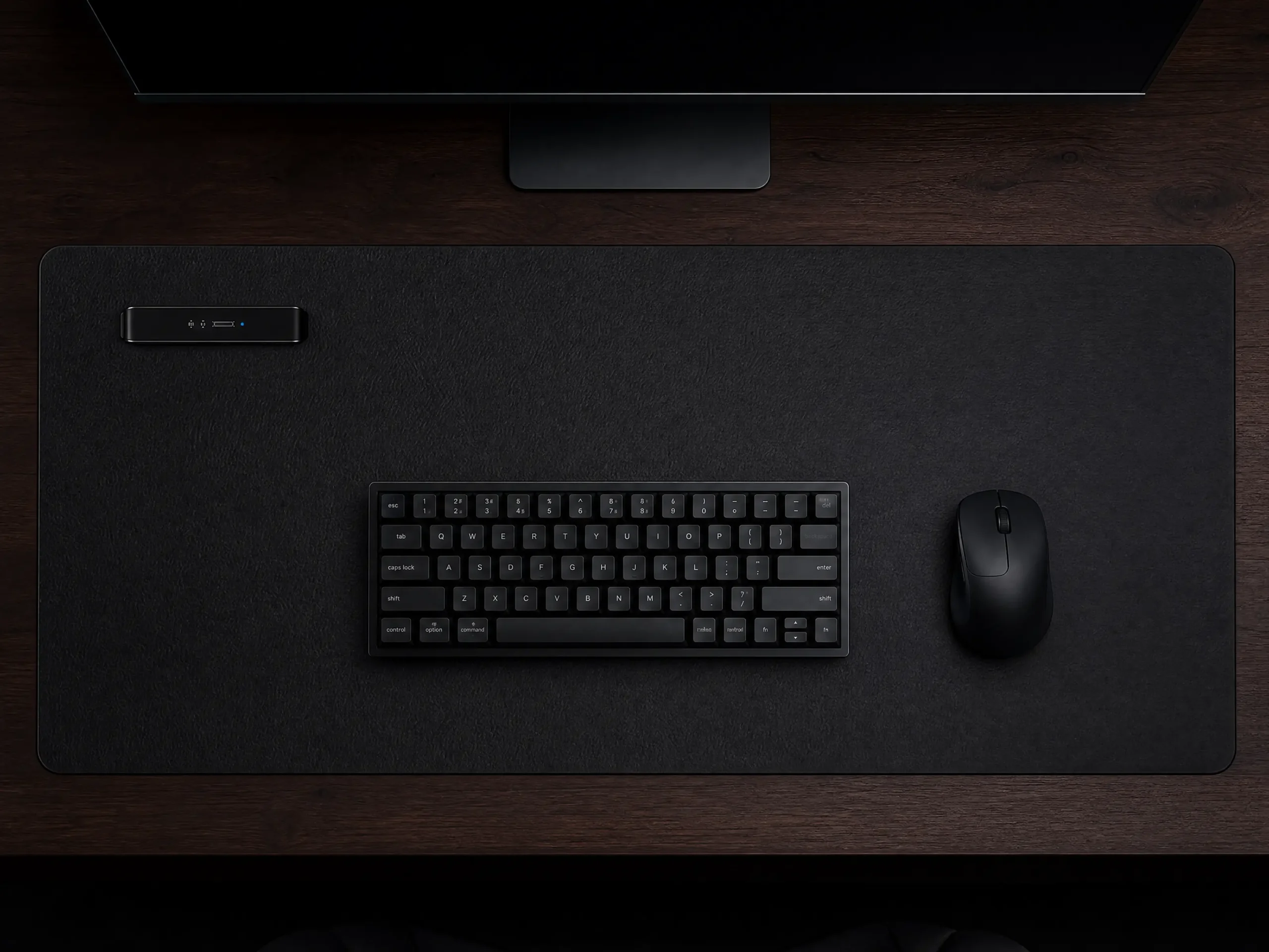 Large matte black desk mat for stealth blackout setup