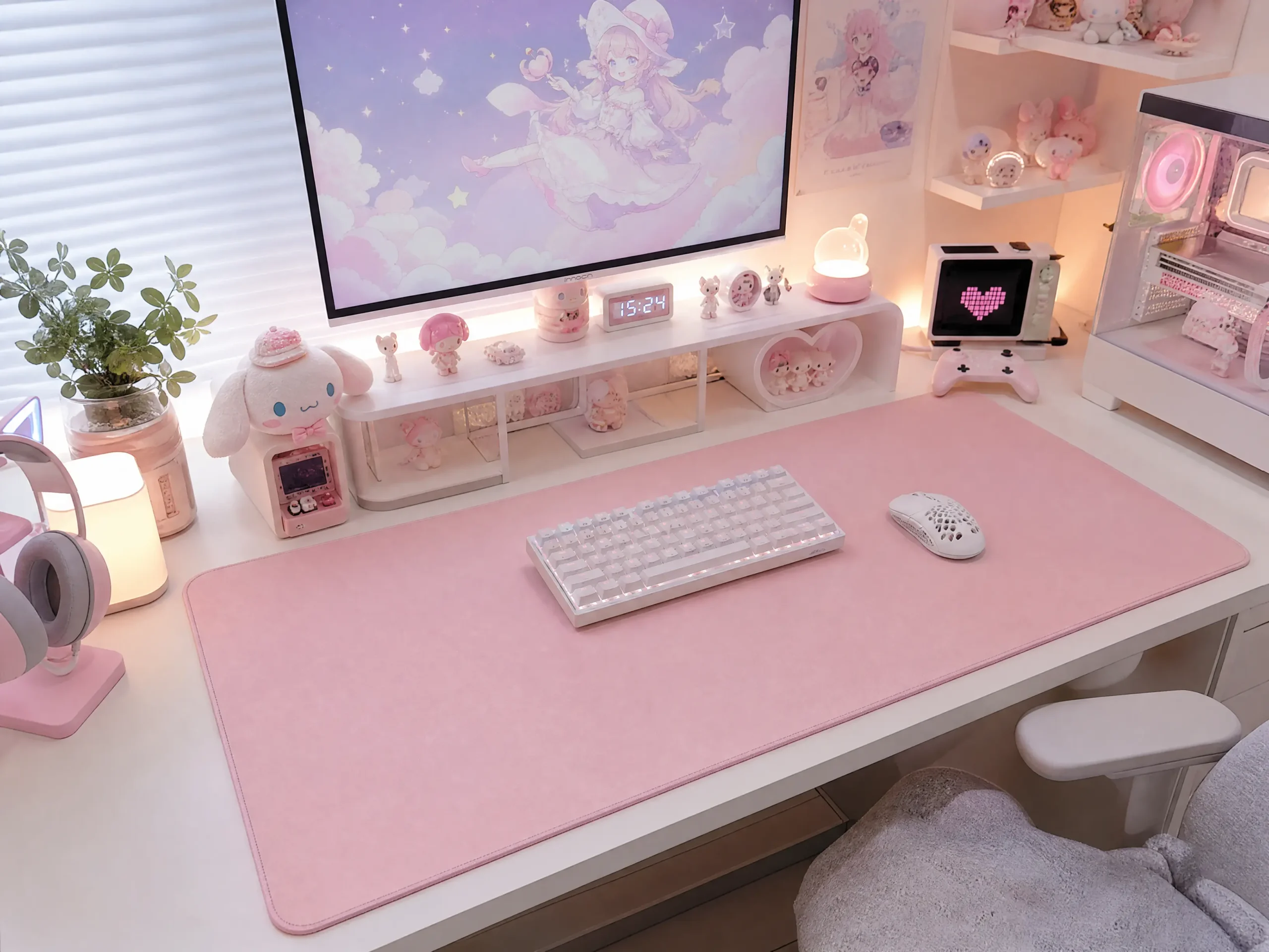 Large pastel pink extended desk mat for gaming setup