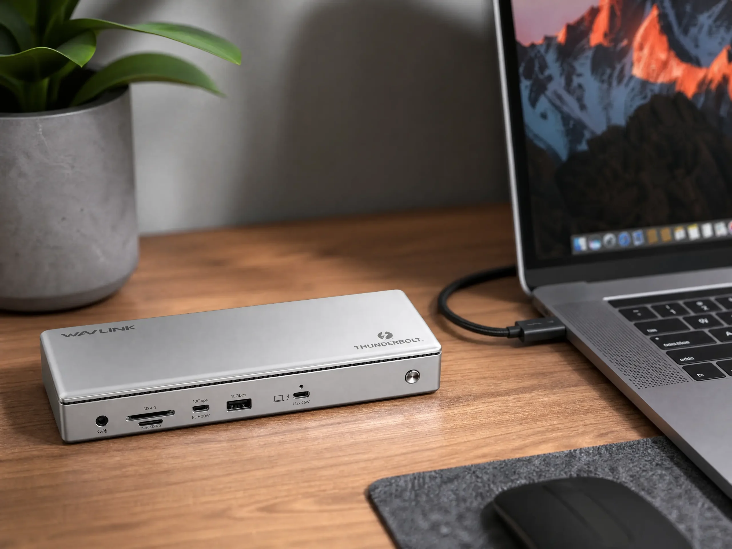 Sleek aluminum Thunderbolt 4 docking station with a single USB-C cable routing