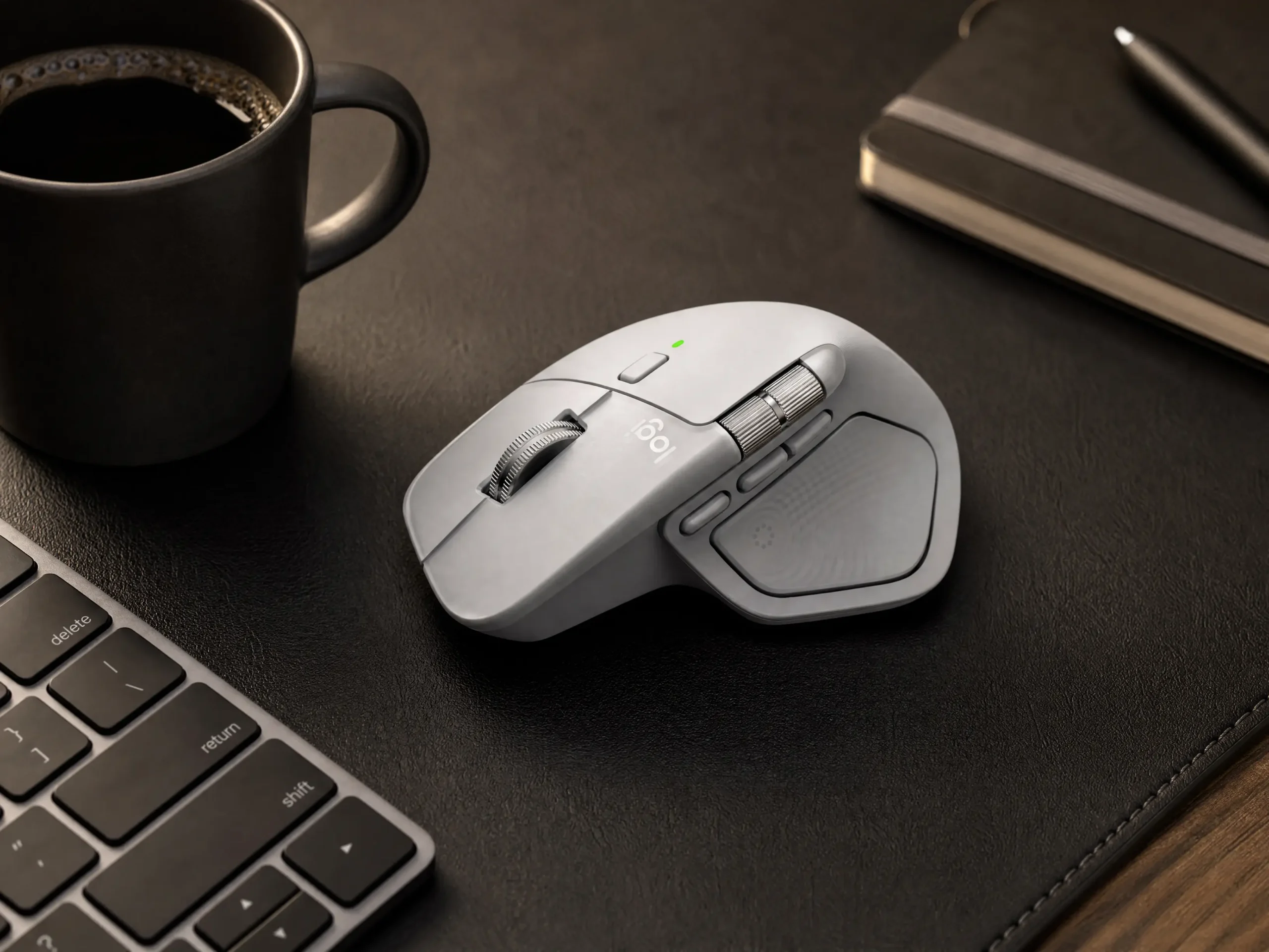 Premium ergonomic wireless productivity mouse with side scroll wheel on a desk mat