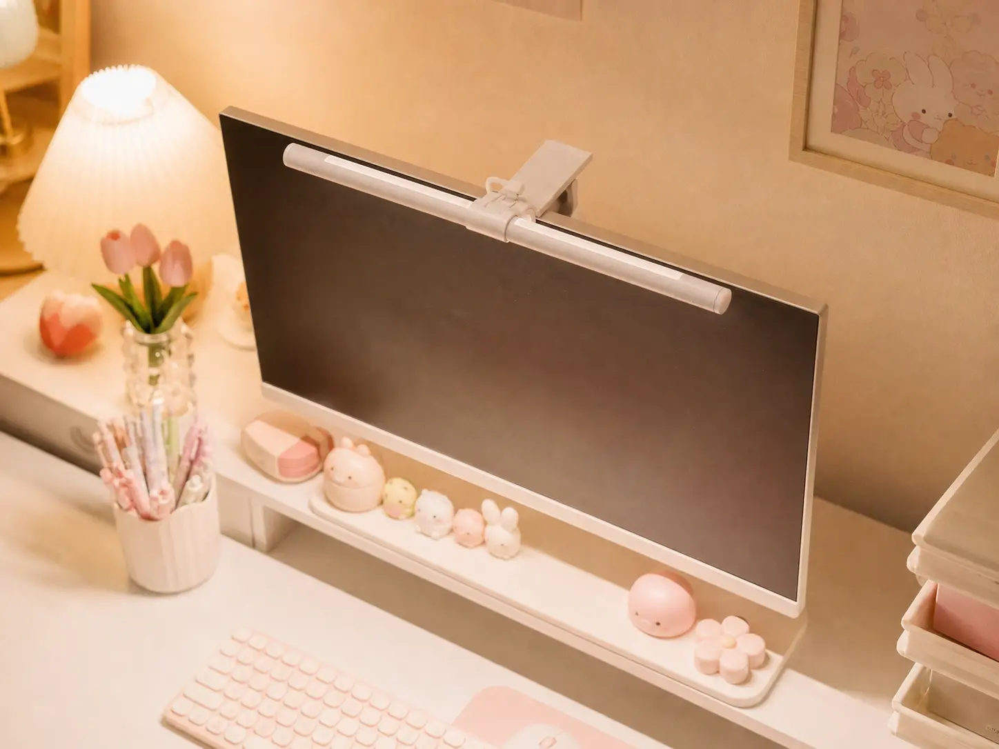 Photorealistic angled shot of a minimalist white monitor light bar attached to a white display in a clean pastel workspace
